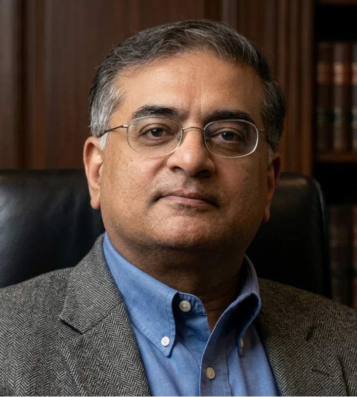 Mayank Trivedi seated in his office